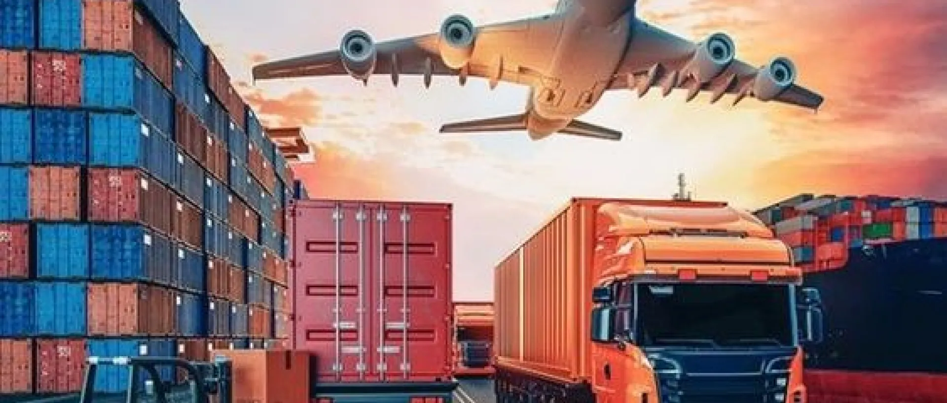 Airplane flying over stacked cargo containers, trucks, and a forklift at sunset, representing the use of logistics software to optimize supply chain management, improve efficiency, and ensure timely delivery.