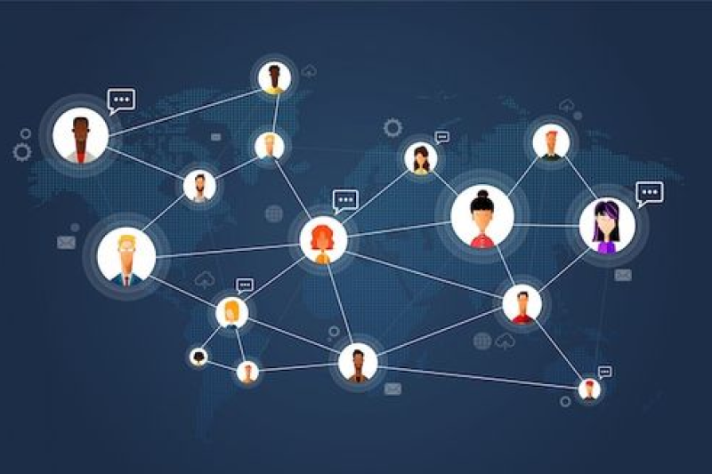 Illustration of connected user avatars on a global map, representing Samyak Infotech's development of an interactive social networking application using AngularJS, featuring real-time messaging, profile customization, and content sharing for a social networking startup.