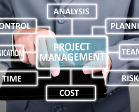 A business professional pointing at a digital interface displaying various project management elements such as Analysis, Planning, Team, Risk, Cost, Time, Control, and Communication, emphasizing the holistic project management services offered by an IT outsourcing company to ensure successful project completion.