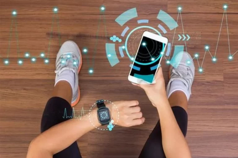 Person in workout gear sitting on the floor, looking at a smartphone and wearing a smartwatch, with fitness tracking data and futuristic graphics overlayed on the image, representing health and workout monitoring.