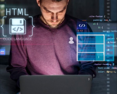 A focused developer working on a laptop with HTML code and interface elements displayed on a digital overlay, illustrating comprehensive full-stack development services provided by an IT outsourcing company to deliver high-performance applications.