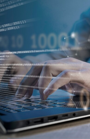 Close-up of hands typing on a laptop keyboard, overlaid with code and binary data, symbolizing the automation and efficiency achieved through CI/CD pipelines in DevOps consulting services, leading to increased deployment frequency.